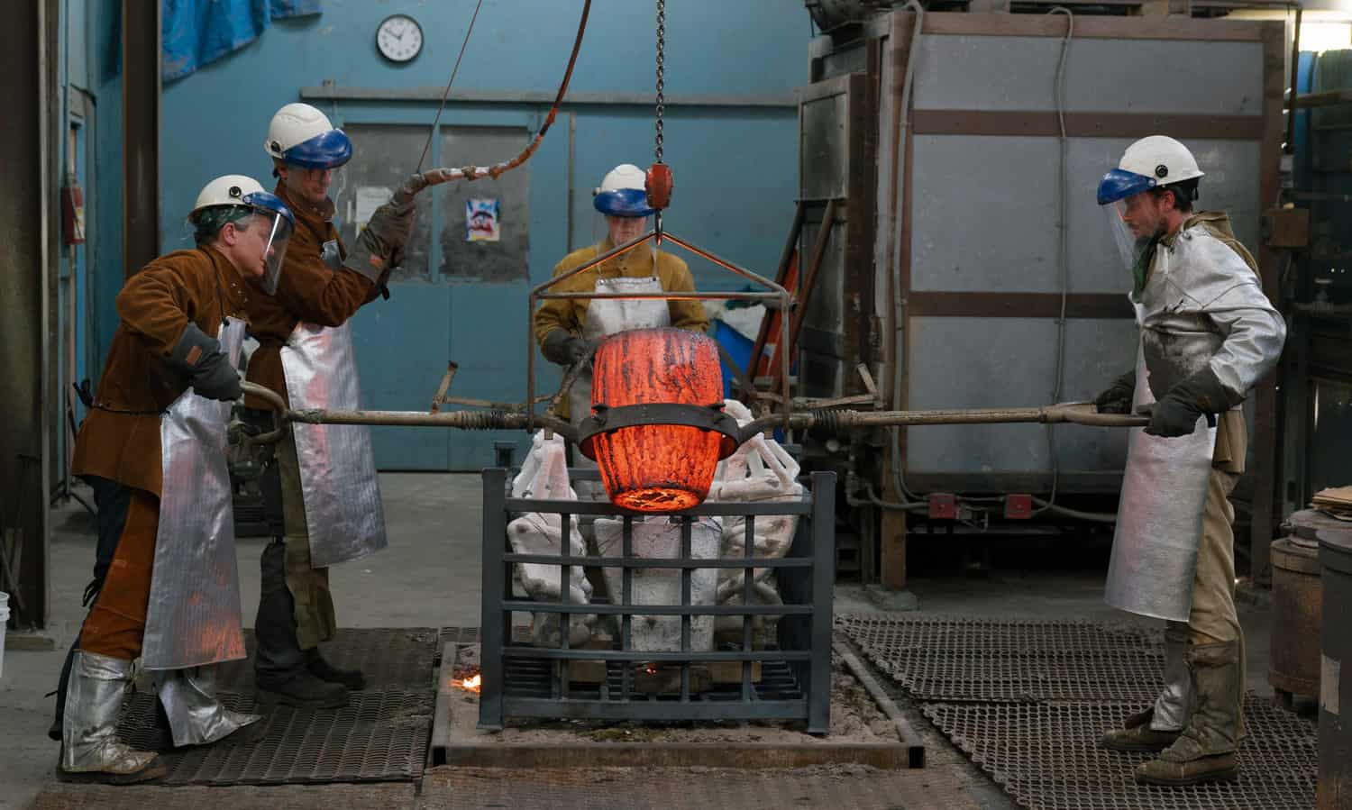 Foundry volunteer working bronze casting production, Odiyan Buddhist retreat